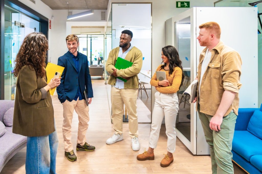 Diverse business team discussing strategy in modern office